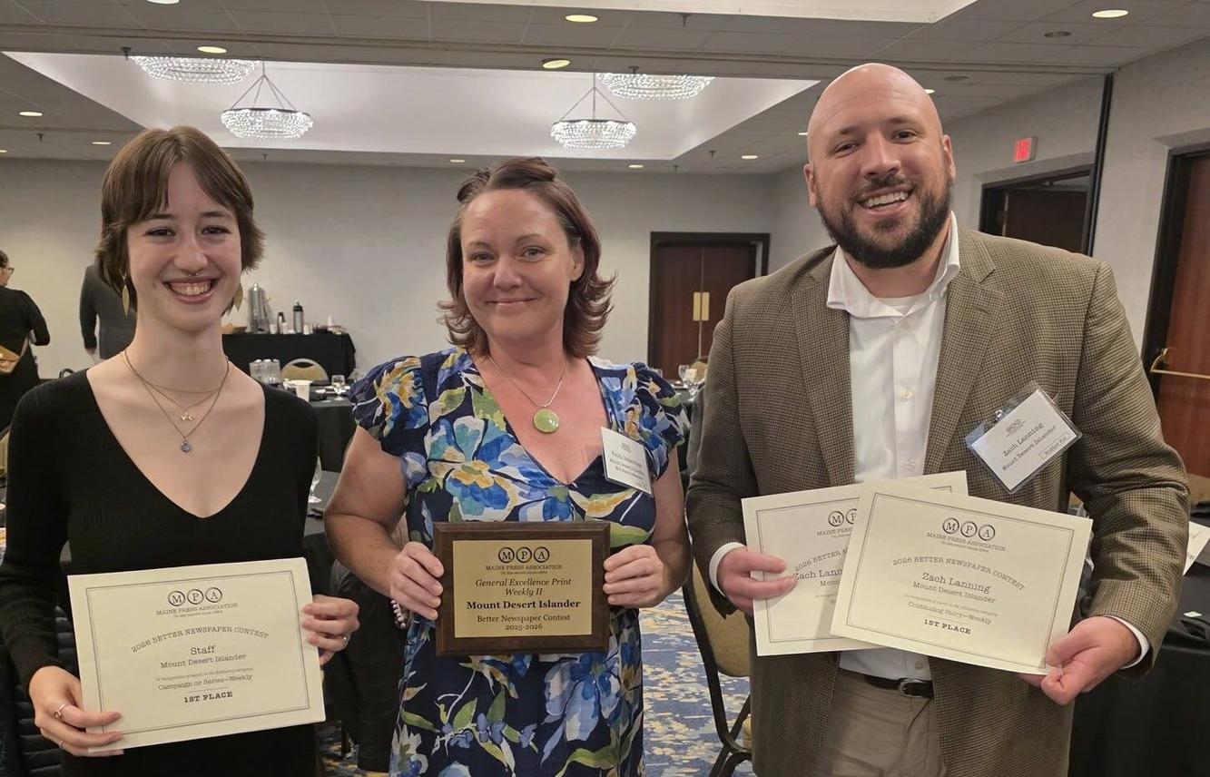 Islander takes top award at annual newspaper conference | News ...