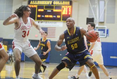 College Basketball Rawls Holmes Lead Gators Past Grove City In