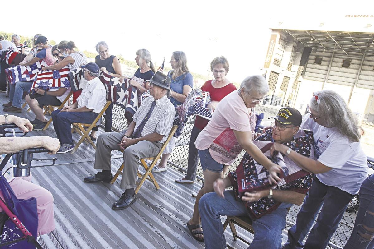 Veterans wrapped in quilts and love at fair ceremony News