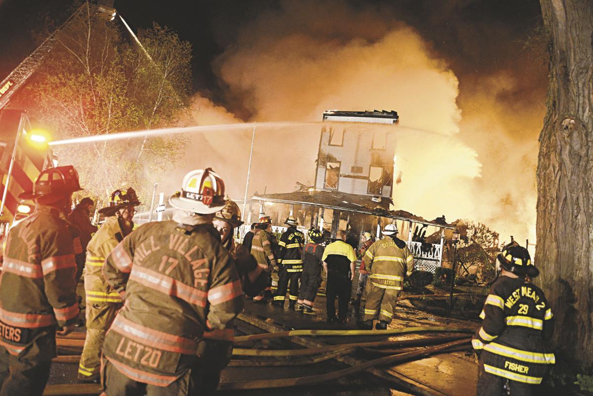 SLIDESHOW Fire ravages Riverside Inn Gallery
