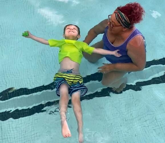 Y teaching kids with autism to swim