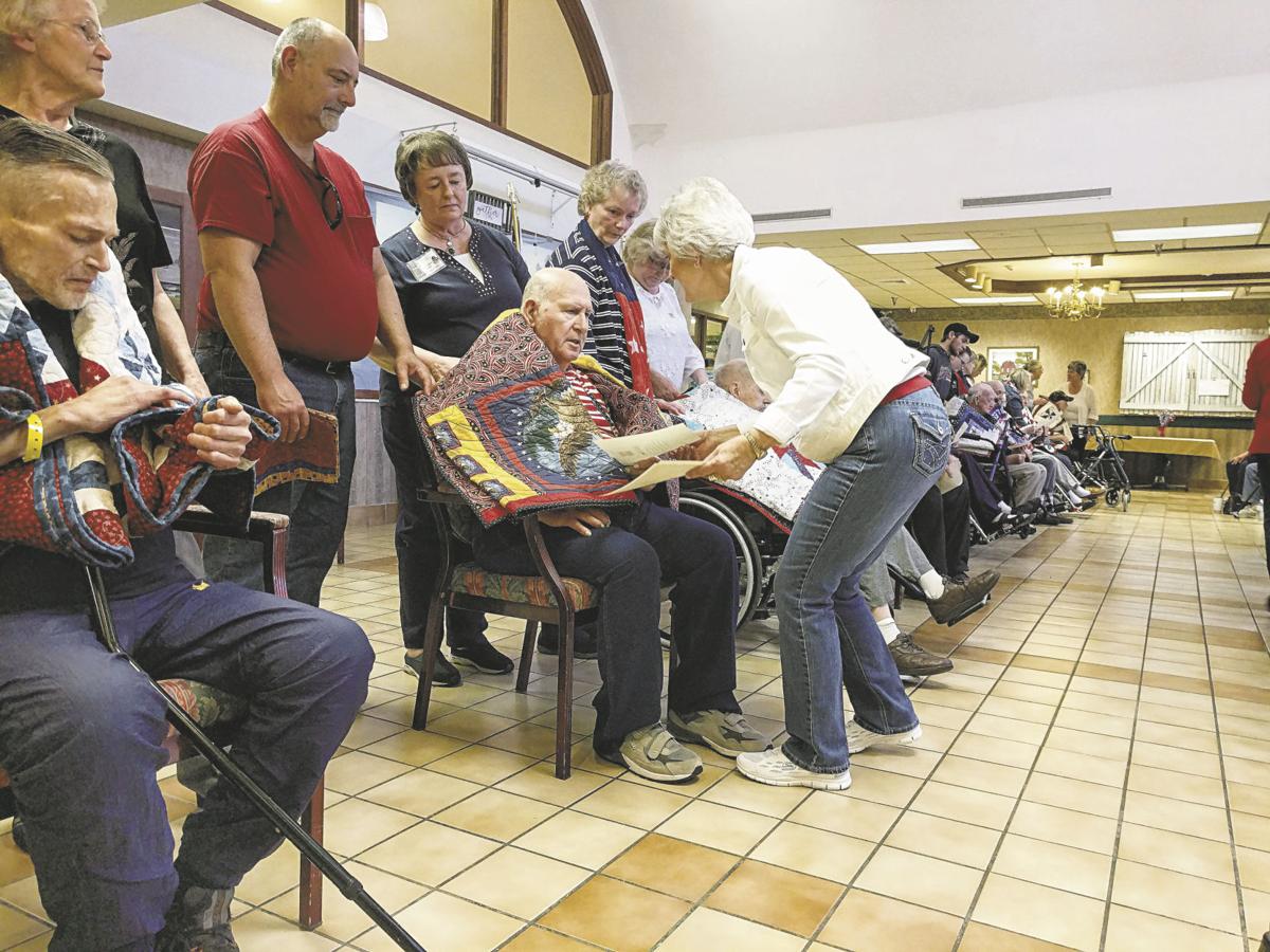 Veterans embraced by quilts and recognition | News ...