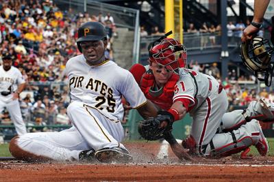 Pirates carry three catchers vs. Giants to protect Russell Martin