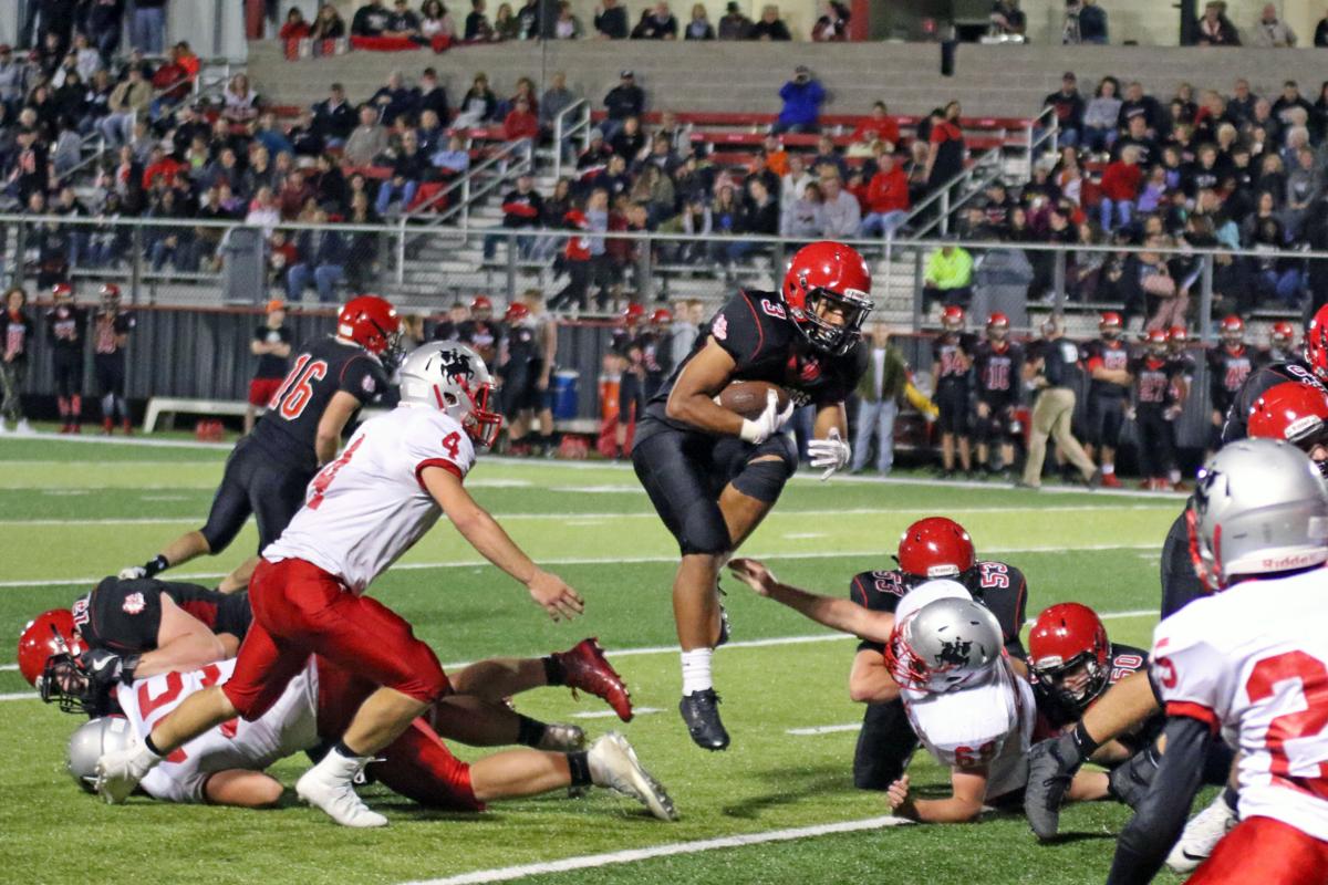 H S Football Dogs Hold Off Lancers For First Win Local Sports