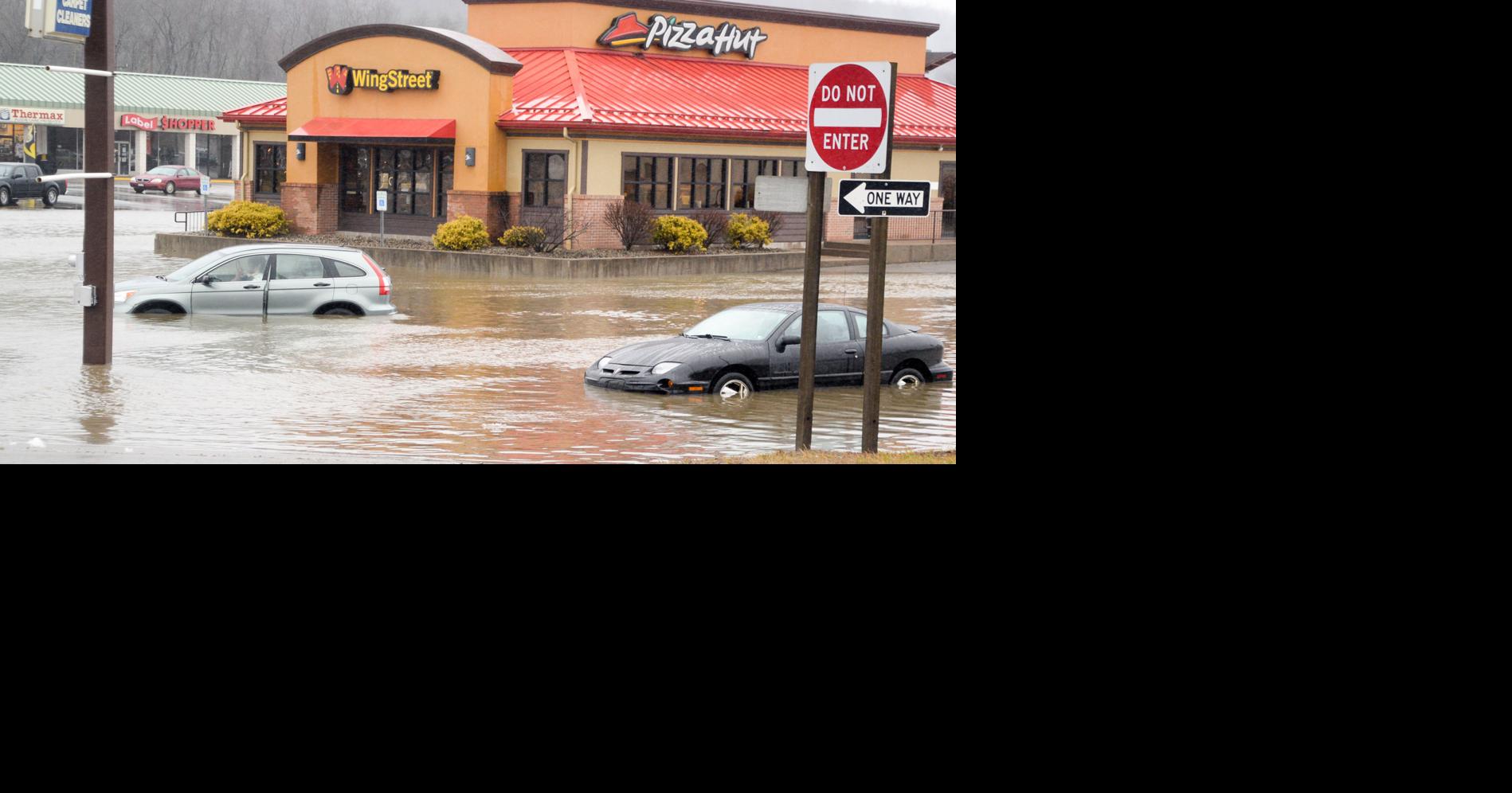Several vehicles reportedly stuck in high water | News ...