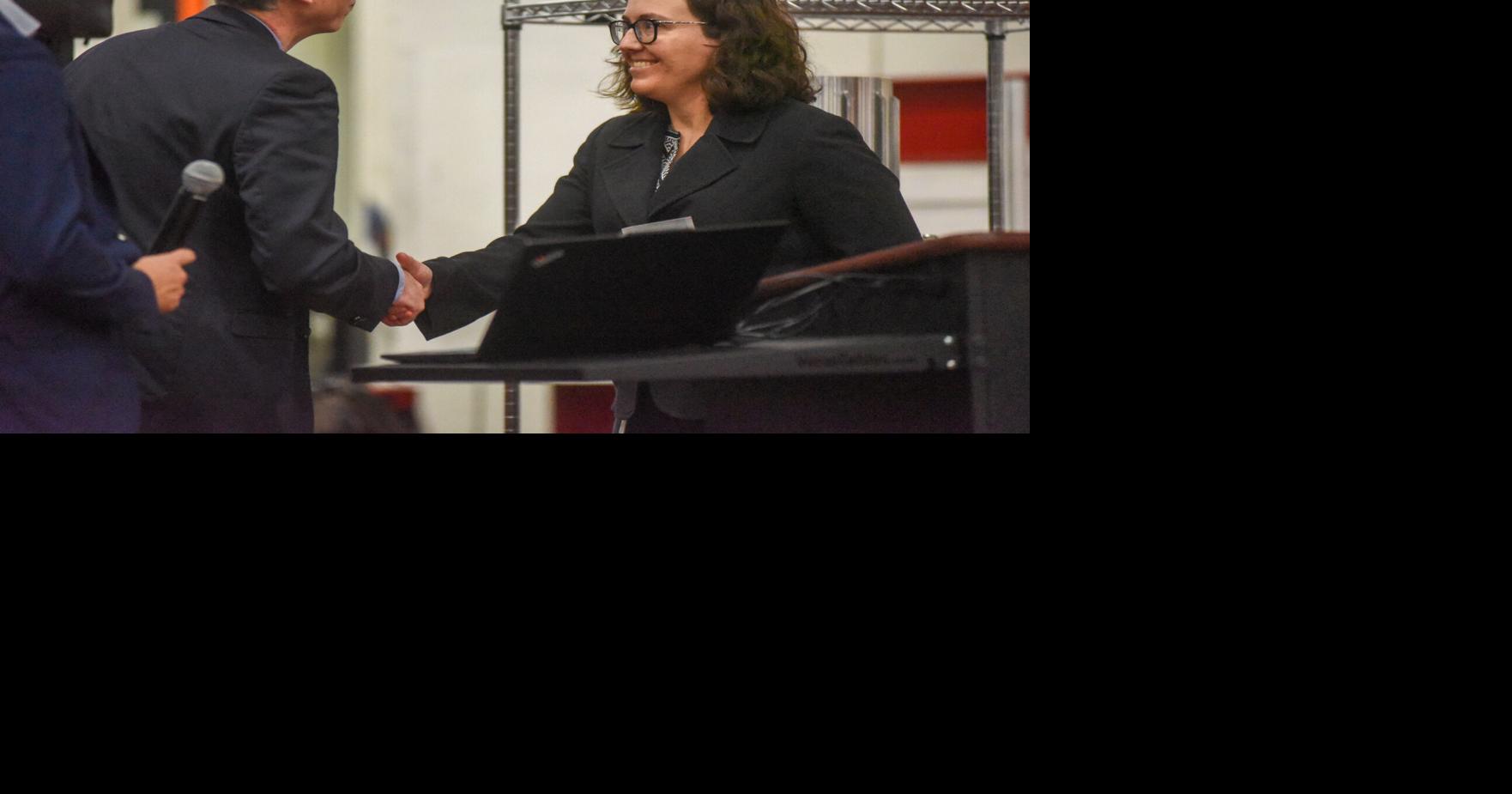 0126 acutec award shaking hands.jpg