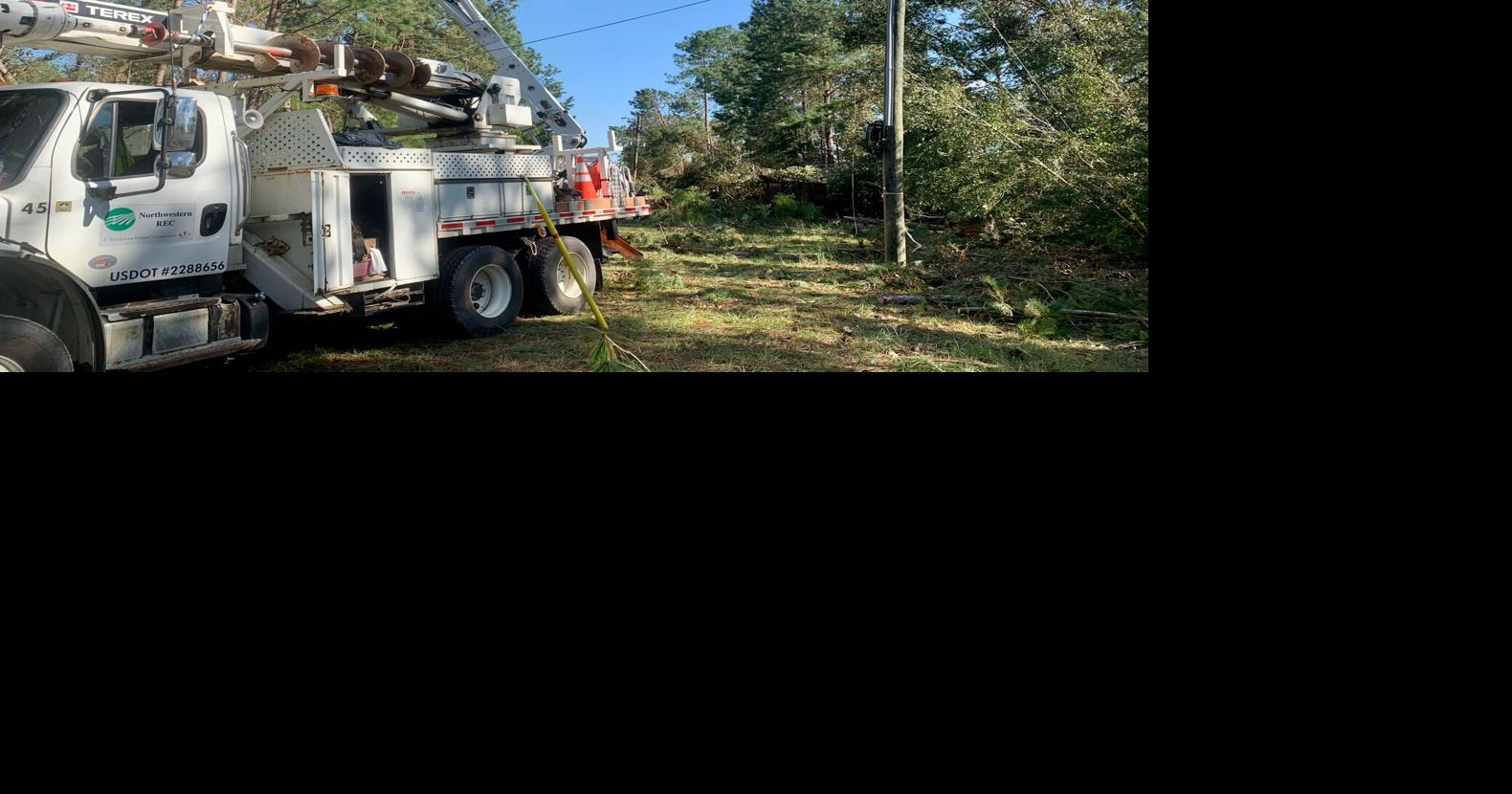 Area electric utilities assist in power restoration efforts in ...