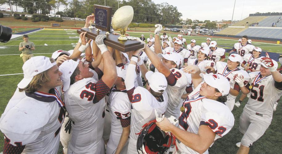 Thompson football receives championship rings celebrating fourth