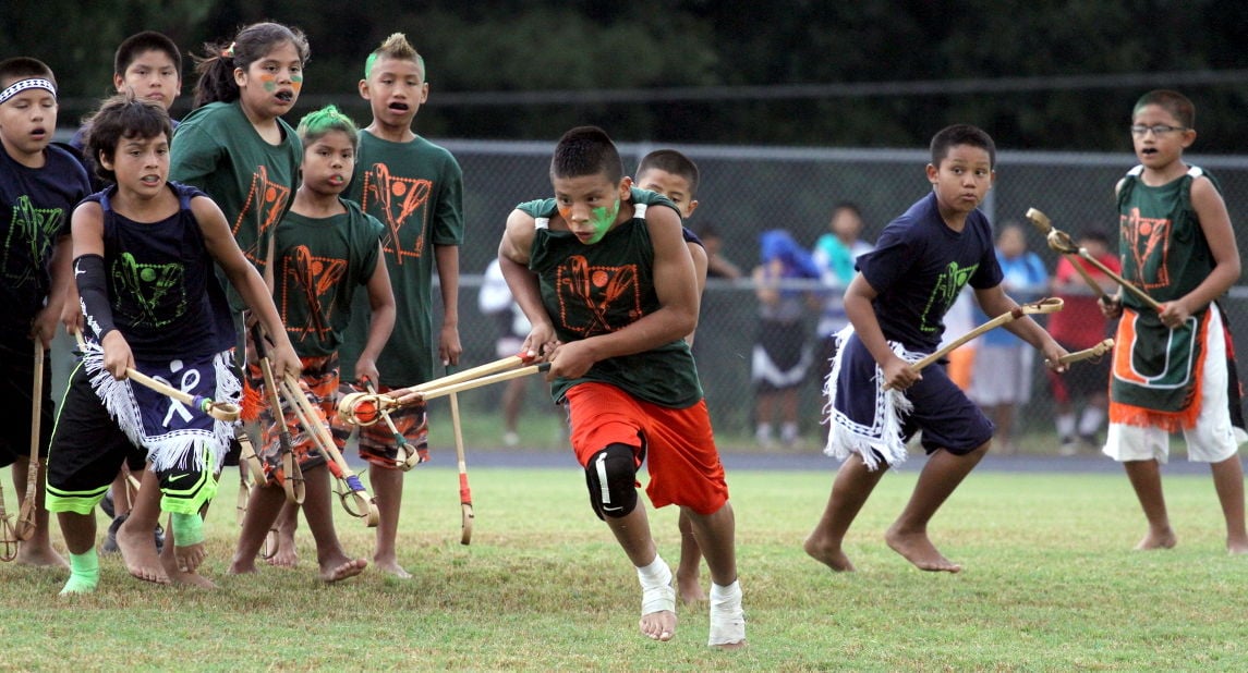 athletes-show-out-in-state-games-stickball-competition-sports