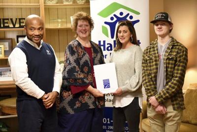 Habitat receives Allie Cat grant to help with roofs
