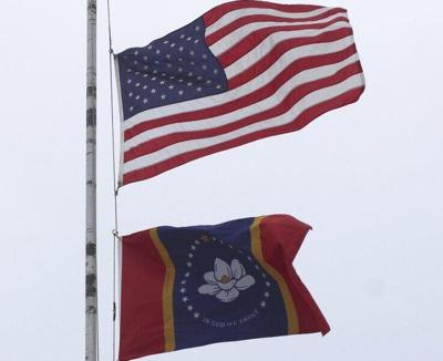 THE YEAR IN REVIEW: Firefighters raise new state flag at Meridian City Hall