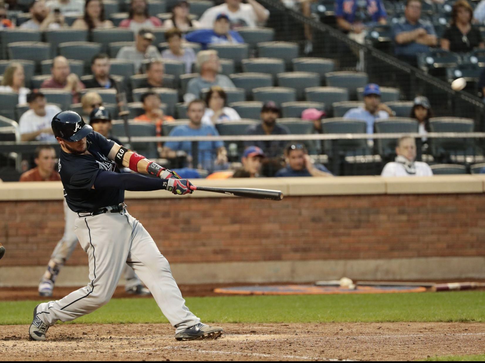 Braves score twice on Suzuki's fielding error, overcome 6-run