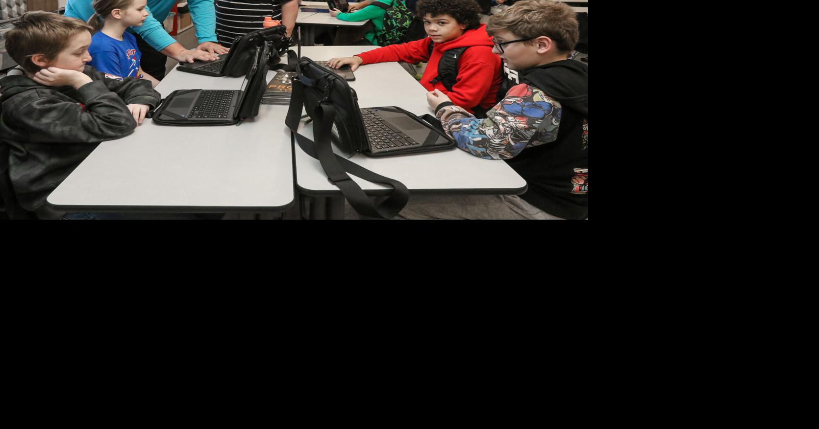 Hour of code OPS elementary students learning how to program News