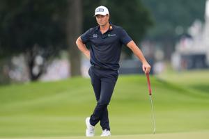 Hovland surges to a 1-shot lead at Tour Championship