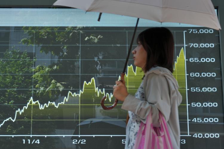 Asian shares mostly decline as bond market pressure mounts | AP ...
