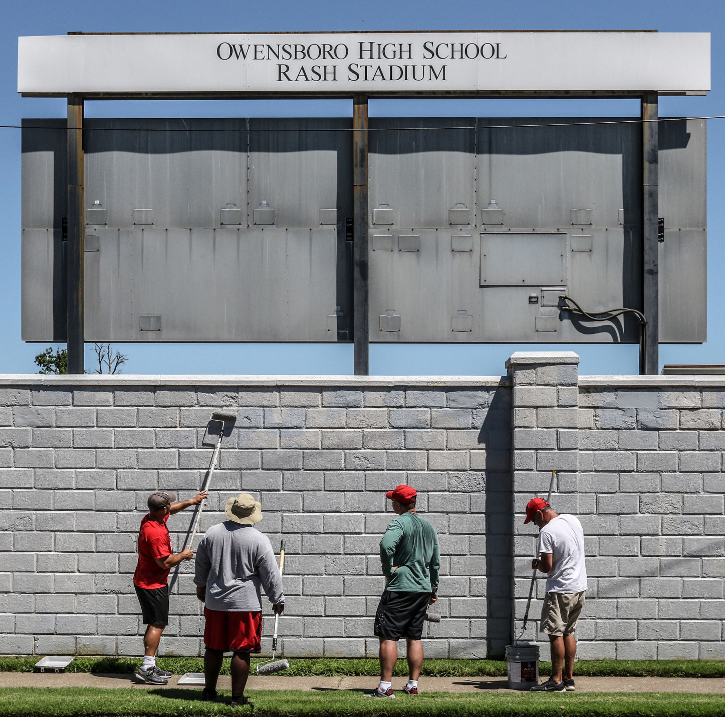 OHS coaches do painting project at Rash Sports messenger-inquirer image