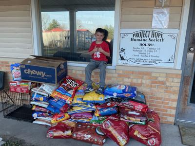 7-year-old receives over 1,000 pounds of dog food for ...