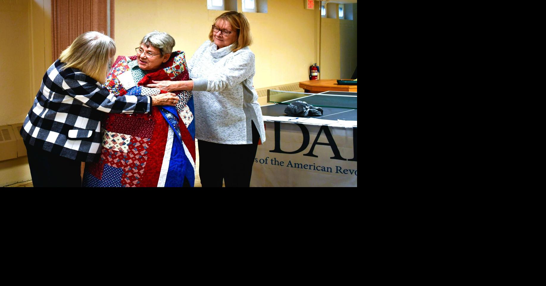 King accepts Quilt of Valor from DAR ‘for all women who’ve served in the military’