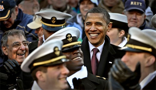 Army Chief of Staff Gen. Raymond T. Odierno, wearing a Navy football jersey,  poses with the