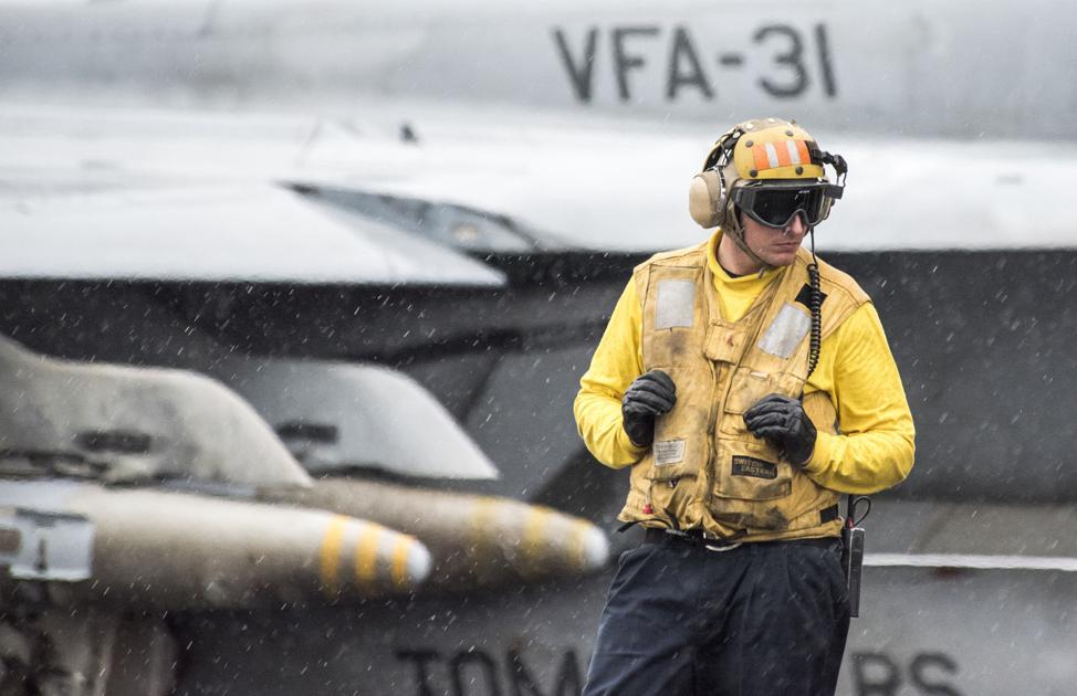 Yellow shirts Setting the tone for the flight deck Top Stories