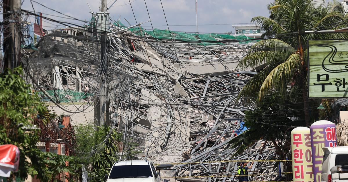A 9-story building under construction in Philippines collapses, possibly trapping dozens of workers