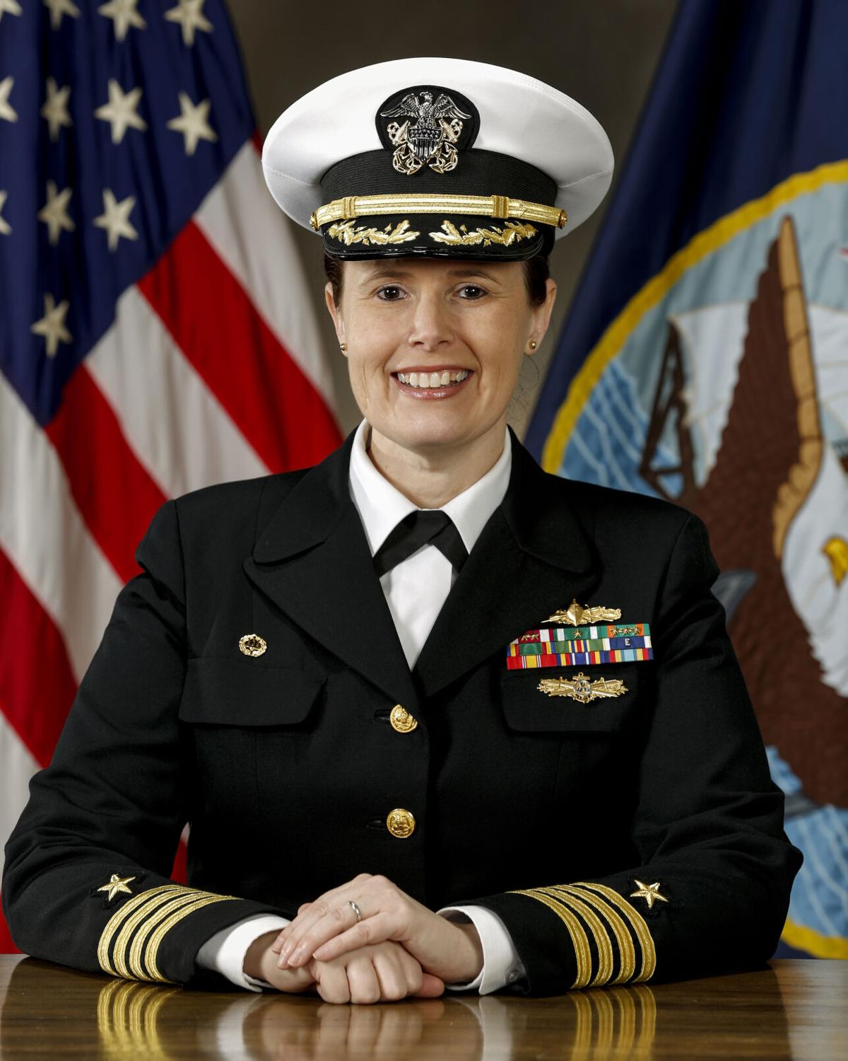 female navy commander        <h3 class=