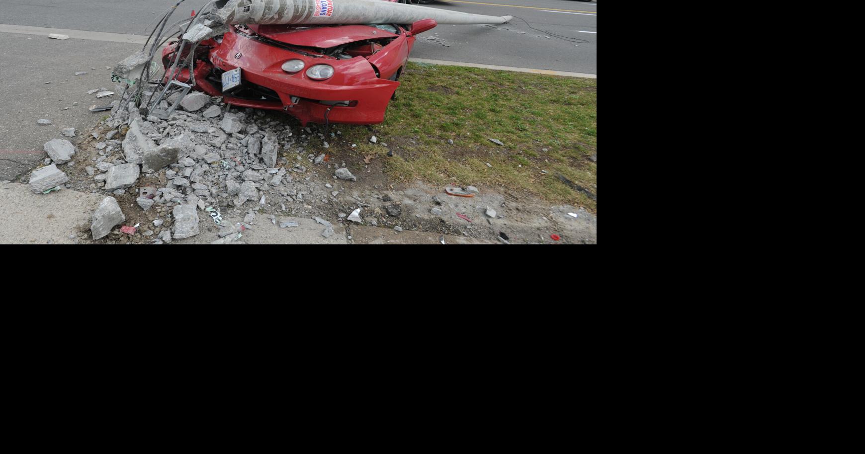 Crash knocks down light pole on Central Pkwy. W.