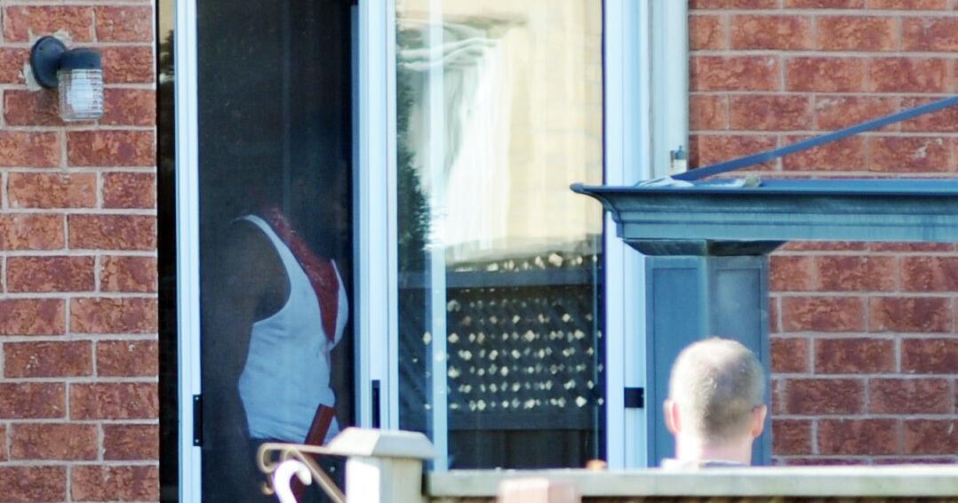 UPDATED: Man with sword barricaded in home