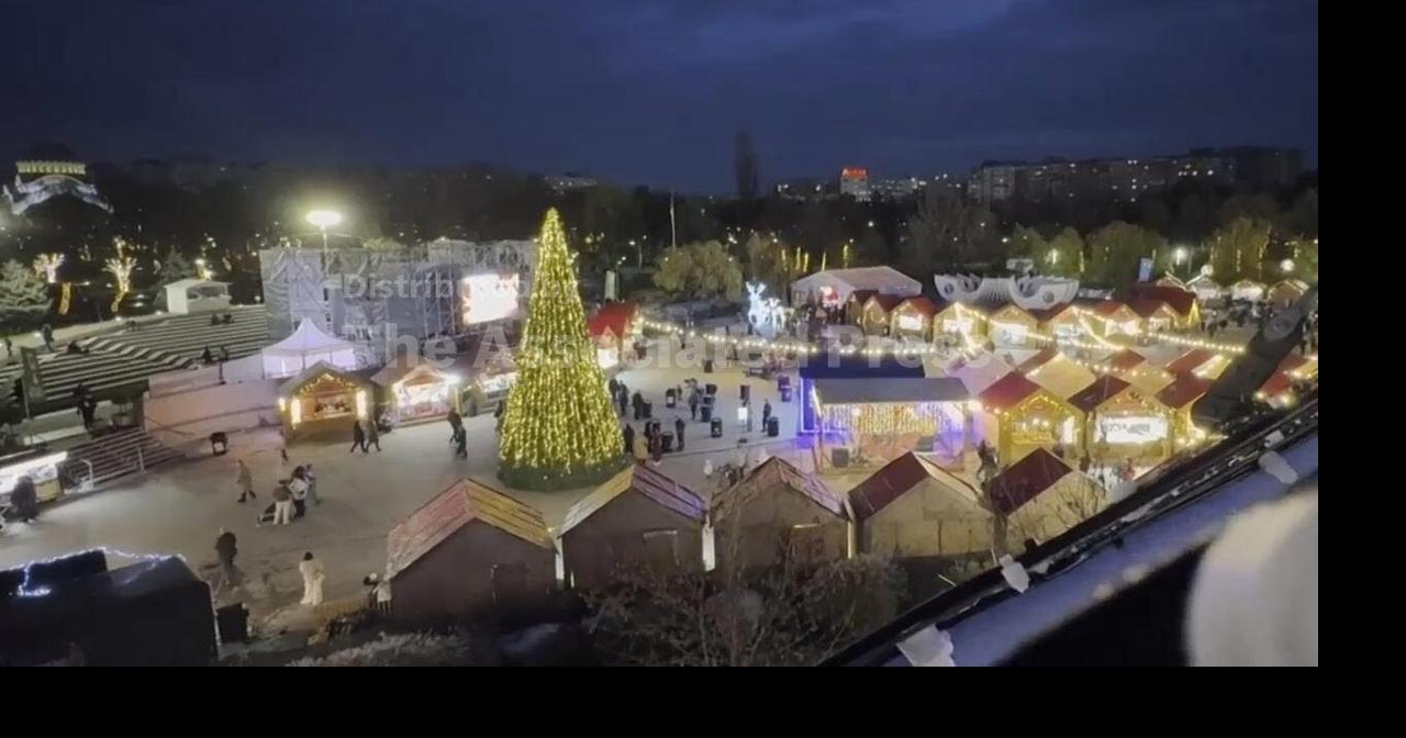 Romanians enjoy Christmas market in Bucharest, despite ongoing austerity