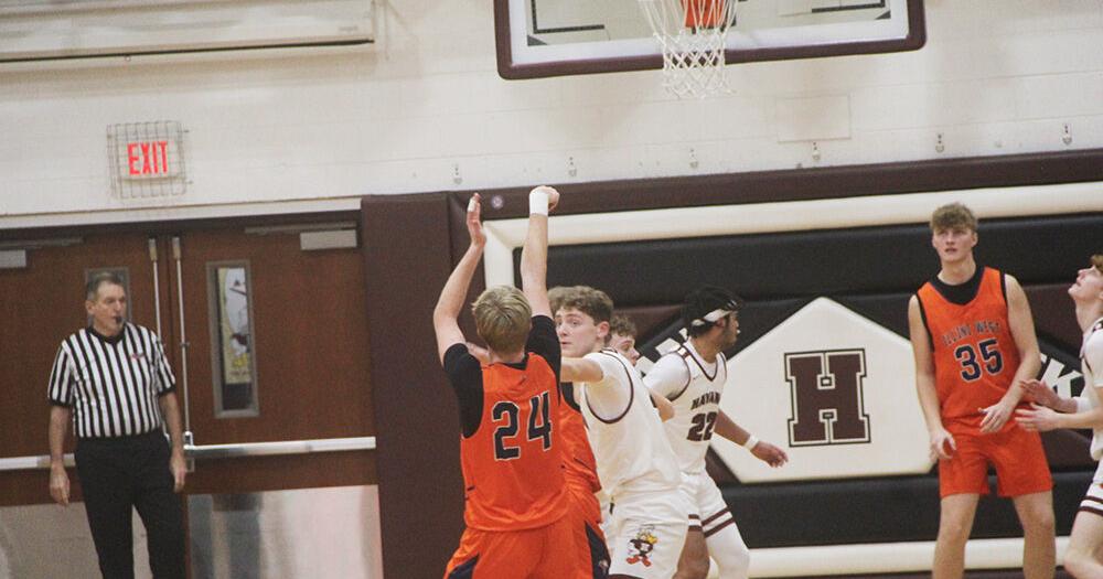 Wesley robertson with two of his 11 points against the Ducks in Havana.jpg