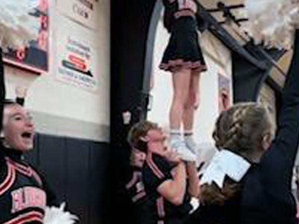 Jed Bruster cheerleader stunt