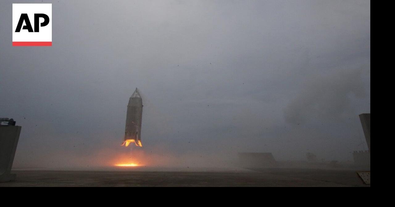 Japan space agency's experimental reusable rocket hovers and lands safely in first test flight