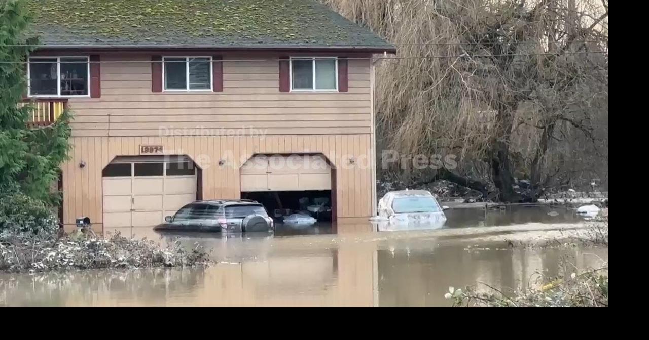 Residents clean up and assess damage after Washington state flooding