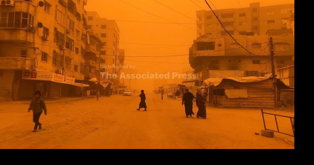 Dust storm blows over Gaza as people are urged to protect themselves