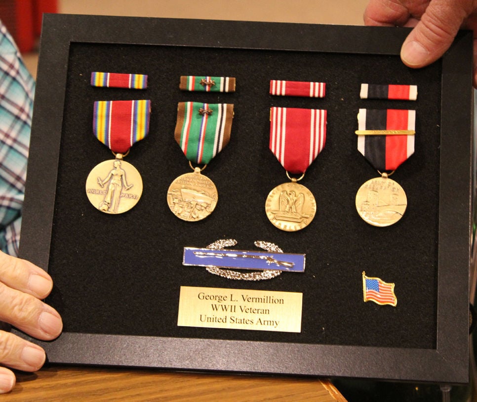 Vermillion medals in case