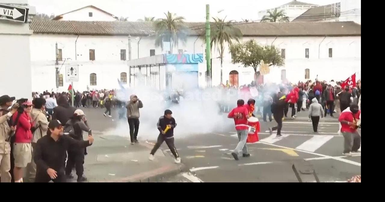 Police fire tear gas during protest against labor reform in Ecuador