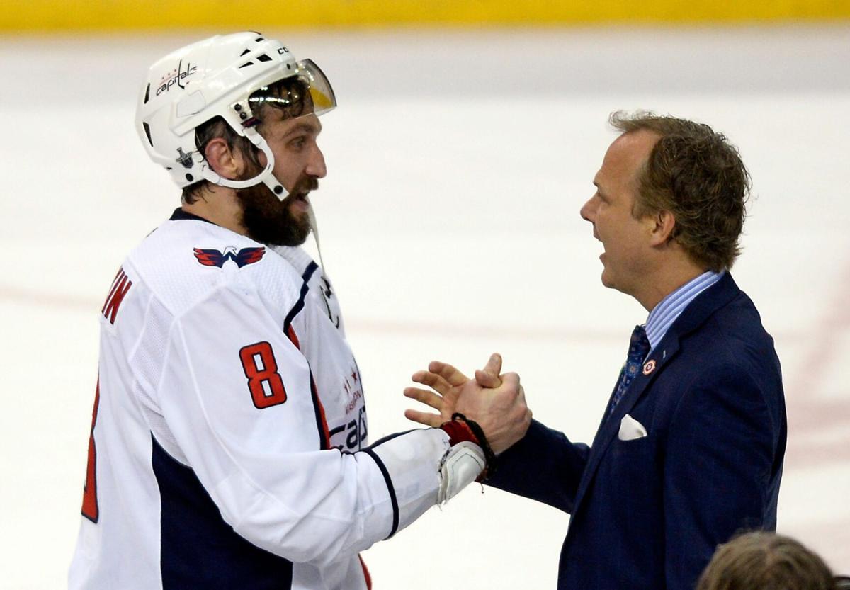 Washington Capitals' Alex Ovechkin (8) shakes hands with