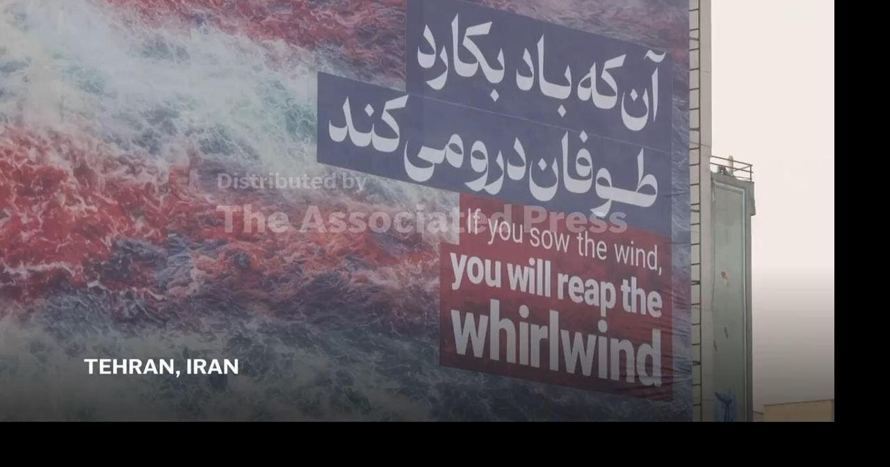 Iranian authorities unveil Tehran mural vowing to respond if US attempts to strike