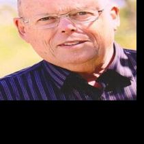 Robert John “Mert” Mertens