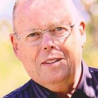 Robert John “Mert” Mertens