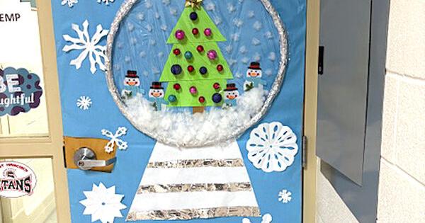 Warsaw students spreading cheer door to door