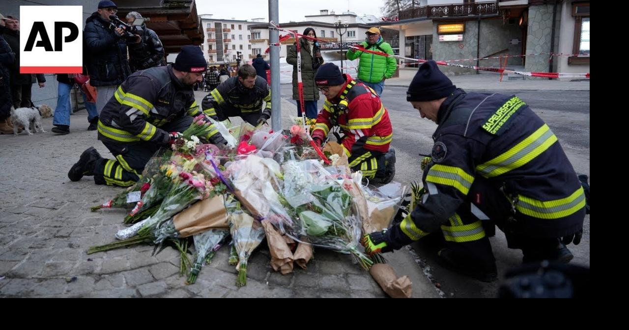 Swiss officials believe sparkling candles atop Champagne bottles ignited fire