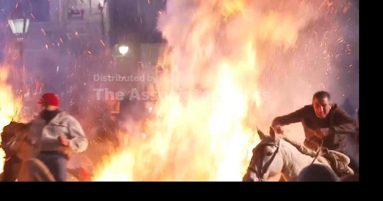 Horses leap through flames as part of Spanish ritual to honor St. Anthony, AP explains