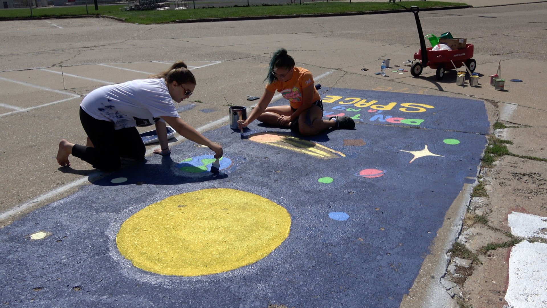 Students mark their spot in the parking lot Daily Democrat Fort