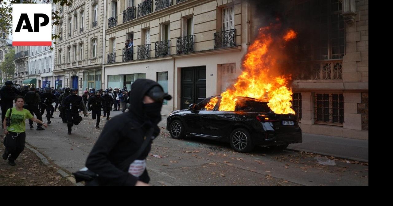 Riot police use tear gas to disperse student protesters in Paris ...