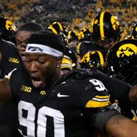 College football: Iowa edges Penn State in nail-biter