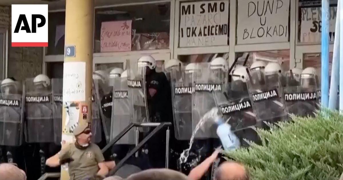 Serbia police clash with anti-government protesters over student expulsion