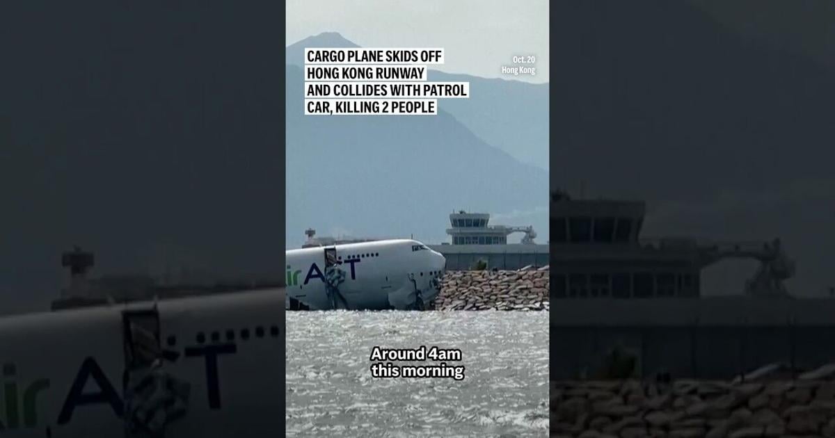 Cargo plane skids off Hong Kong runway and collides with patrol car, killing 2 people