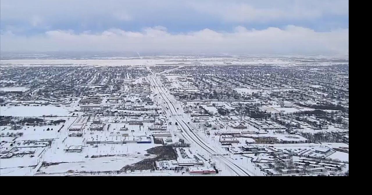 Aerial video shows a snow-covered Oklahoma City