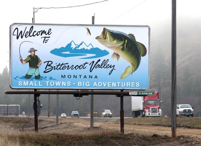 Tourism sign featuring bass stirs up Bitterroot trout anglers